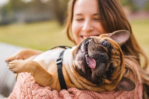 woman with smiling dog