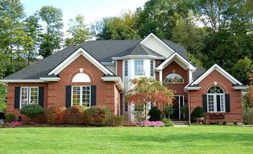 nice home with green yard